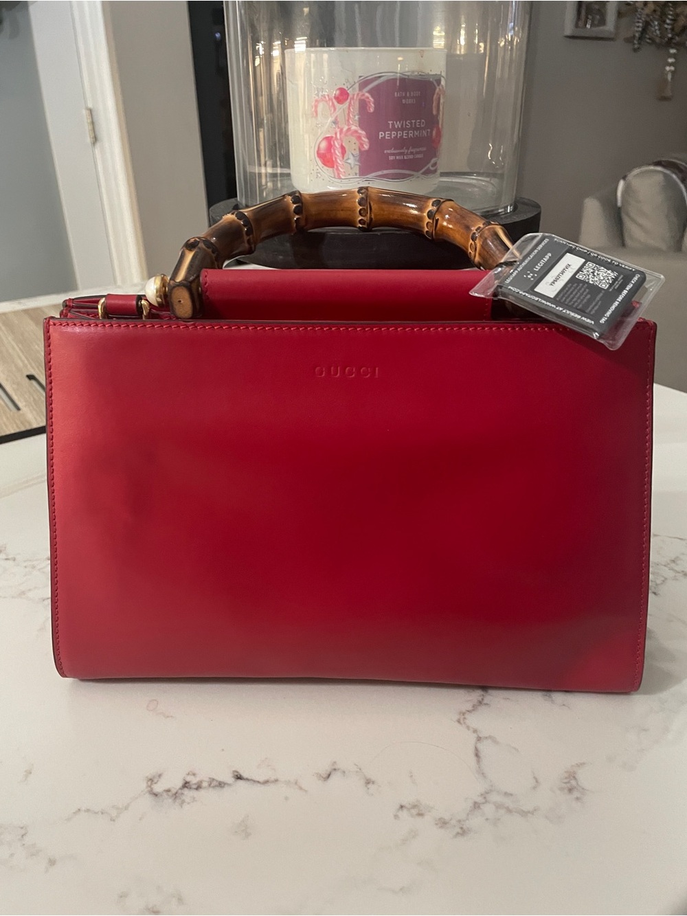 Gucci Nymphaea Bamboo Top Handle bag in red leather